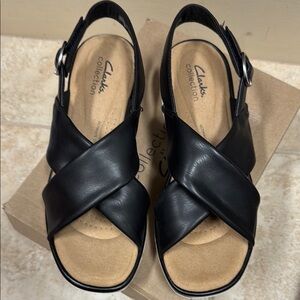 Clarks Black Sandals with Criss-Cross Design and ultimate comfort. Used once.